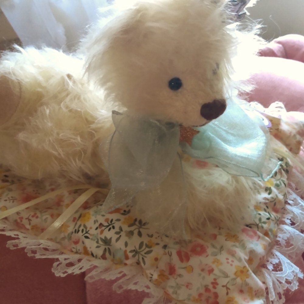 Real fur bear on a pillow  / rug new
